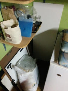the corner of the room where the bodum fell. Framed by a wall on the left and a chest freezer on the right.