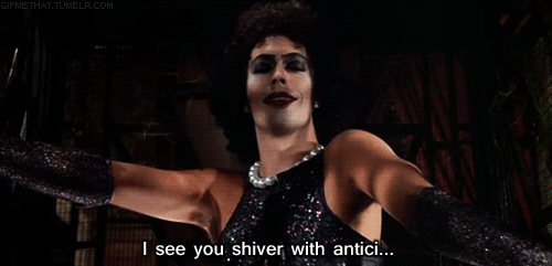 A gif from Rocky Horror Picture Show: "I see you shiver with antici..."